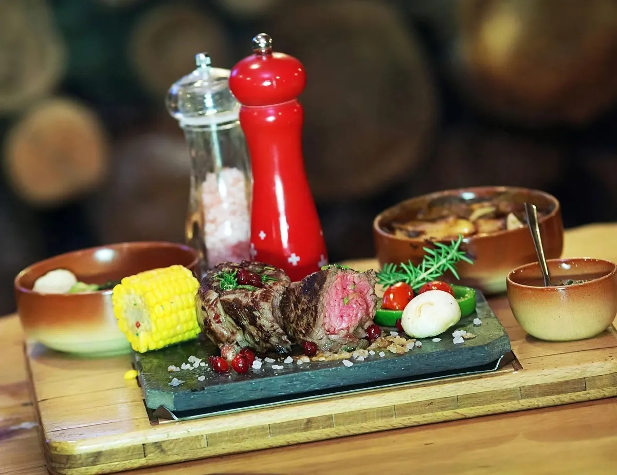 Beef tenderloin served on hot slate